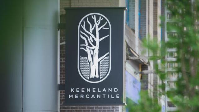 Keeneland Mercantile sign outside of the building the shop is in.